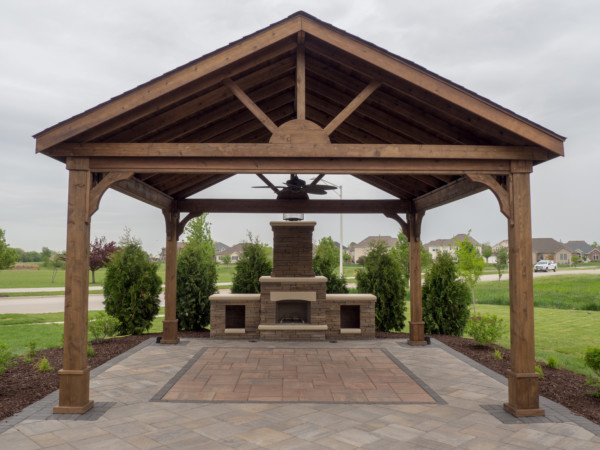 Outdoor Living Area with Pergola and Kitchen