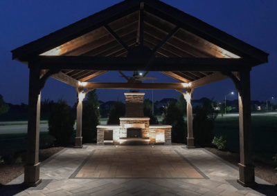 outdoor fireplace and pergola